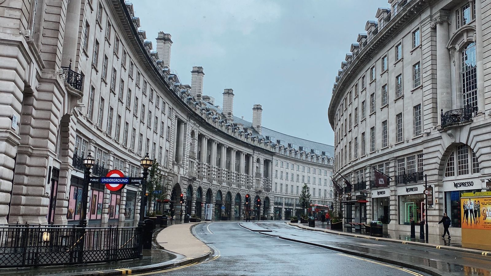 London street with a red bus
