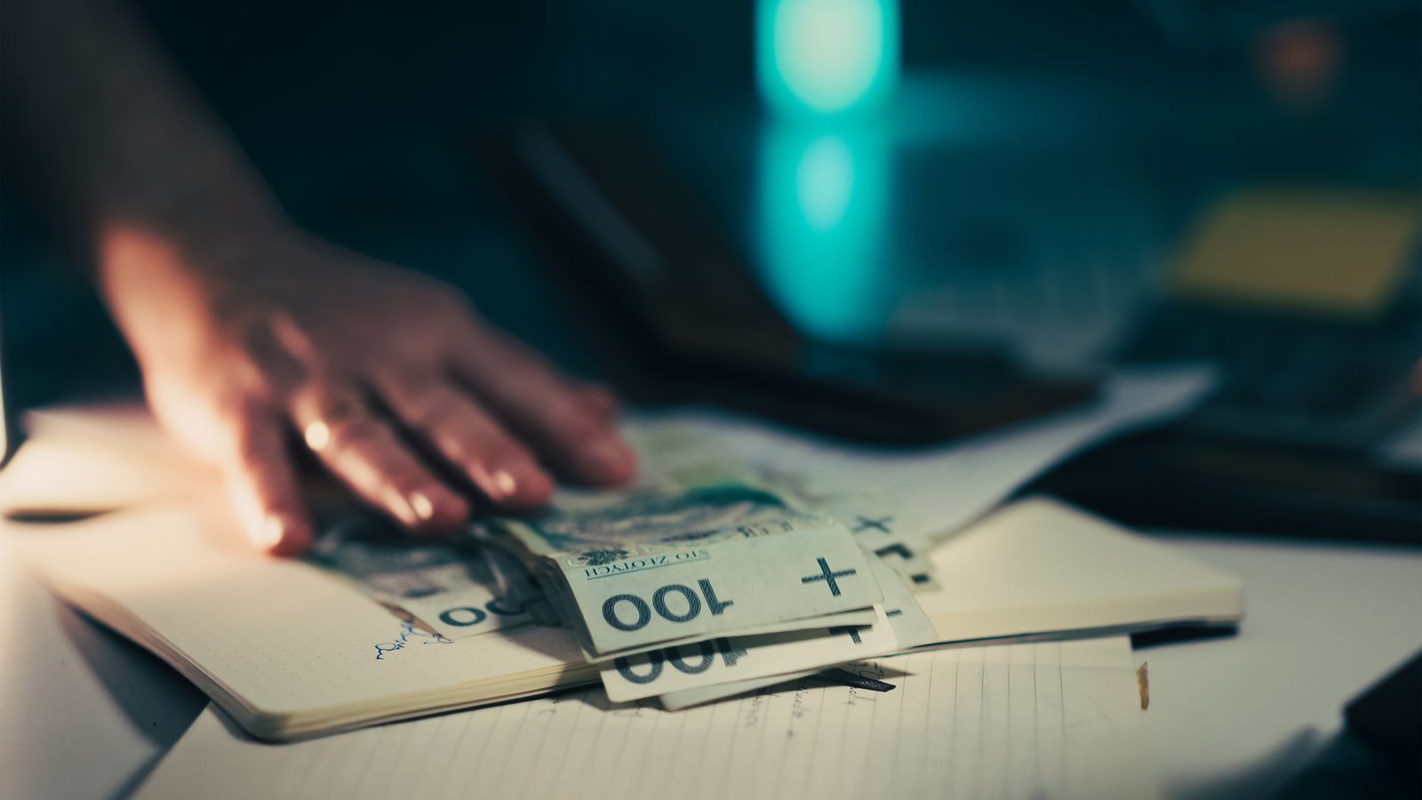 Cash next to a smartphone